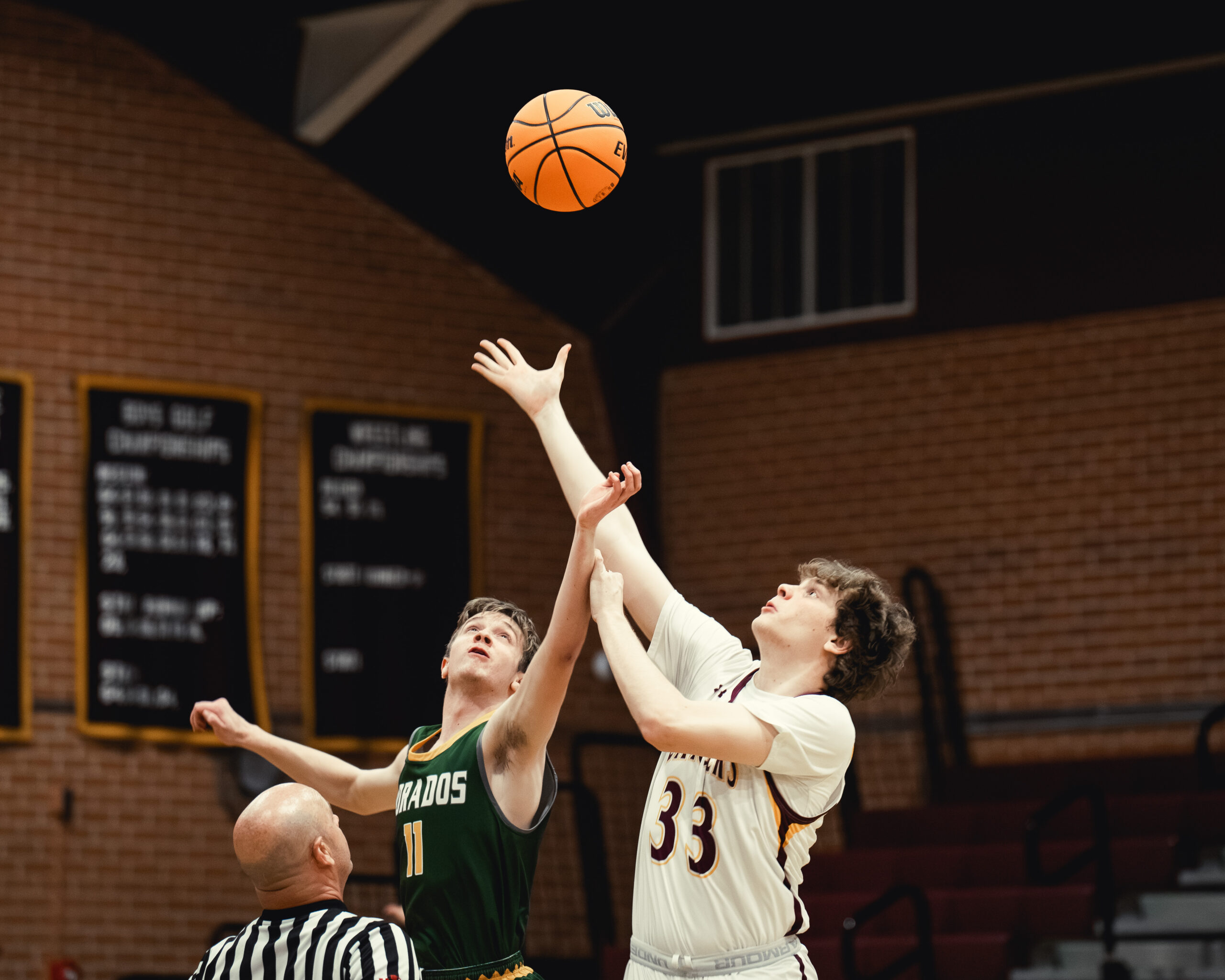 Male playing basketball