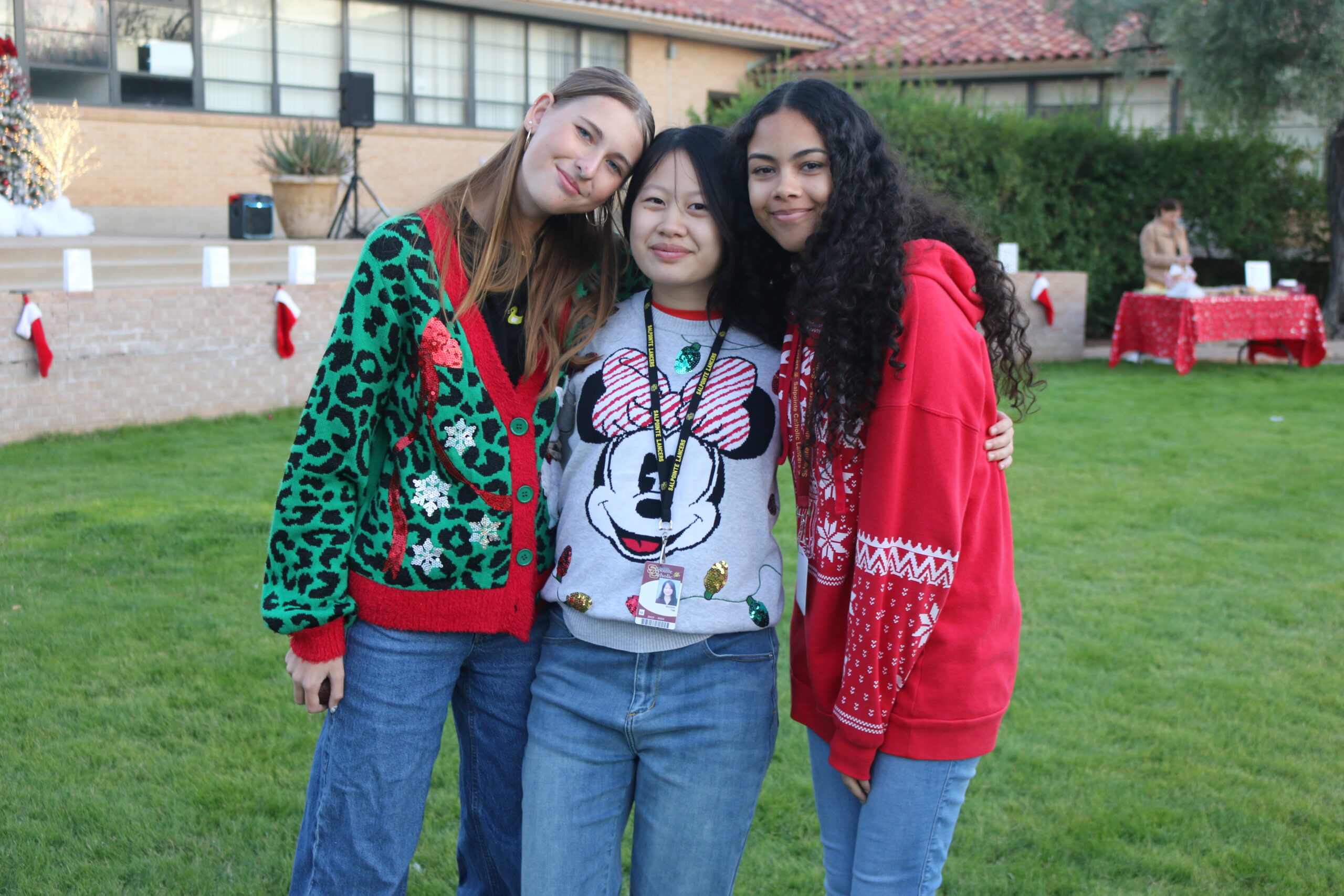 Students wearing Christmas sweaters